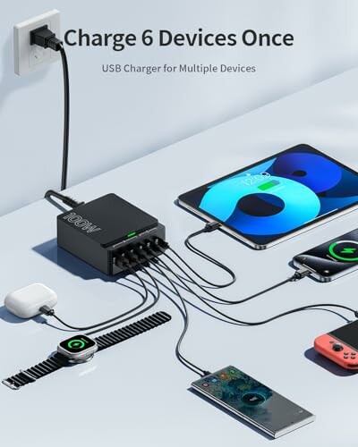 USB charger powering multiple devices including phones, tablets, and smartwatches.